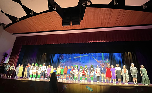 Parkway Elementary School's third and fourth graders on stage performing Willy Wonka Kids