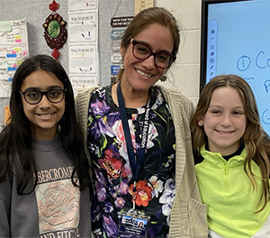 two students and a female aide